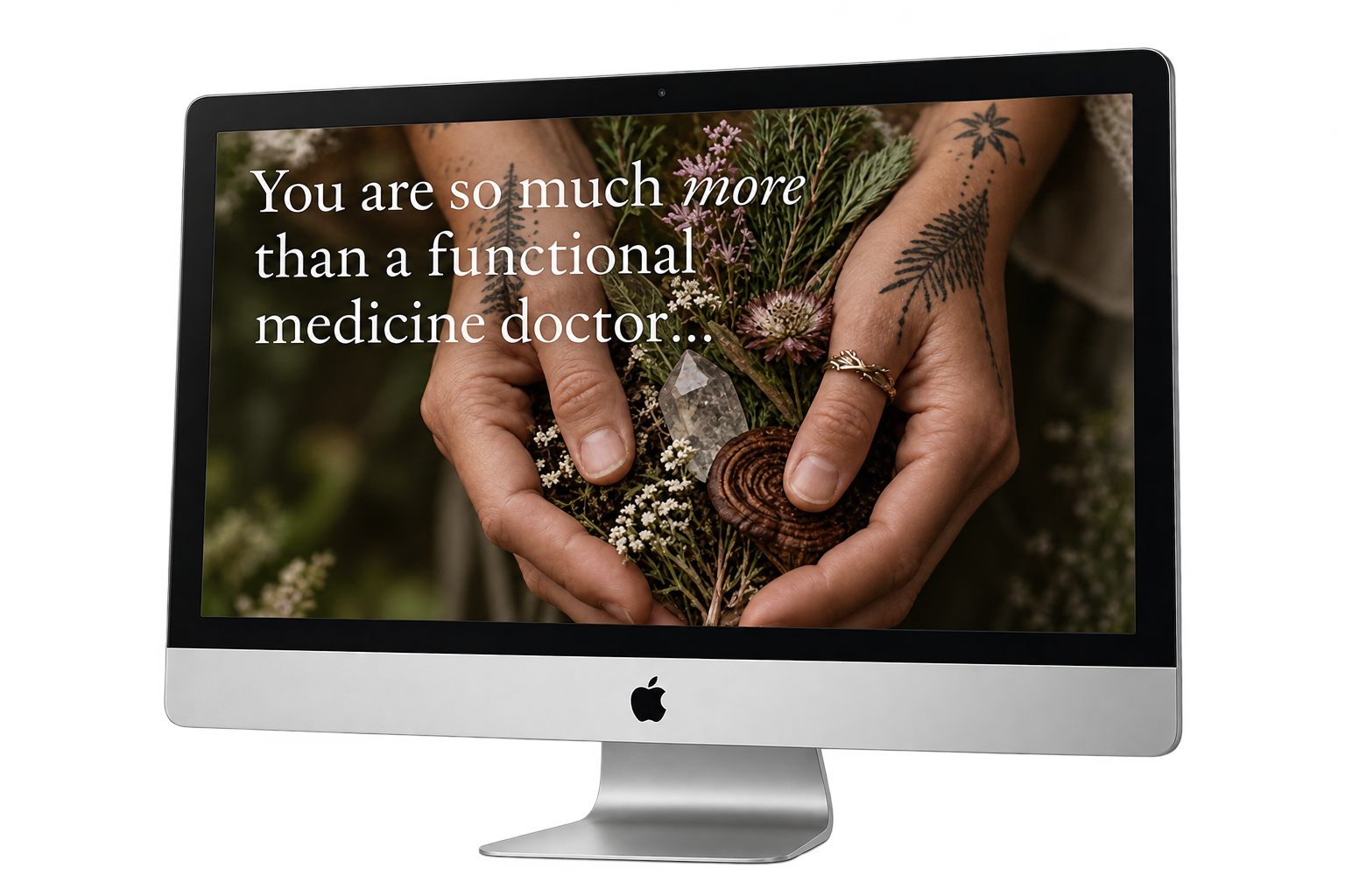 Desktop monitor displaying hands holding plants and the words: You are so much more than a functional medicine doctor